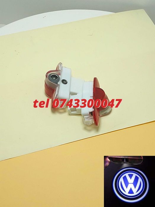 Set 2 Proiectoare Cu Logo Portiere Vw Golf Iv Caddy Touran Bora