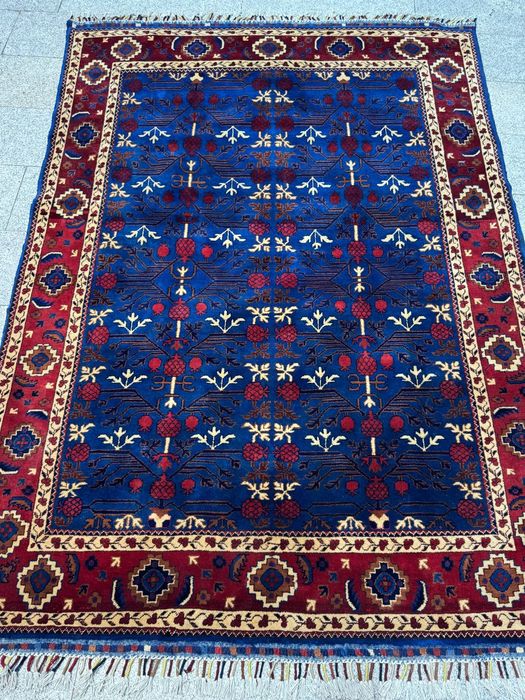 Гилам (Afg'on gilamlari qo'lda to'qilgan)