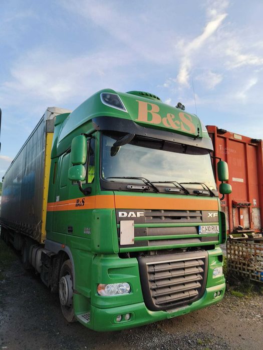 Vând ansamblu - camion DAF și semiremorcă SCHMITZ (mega)
