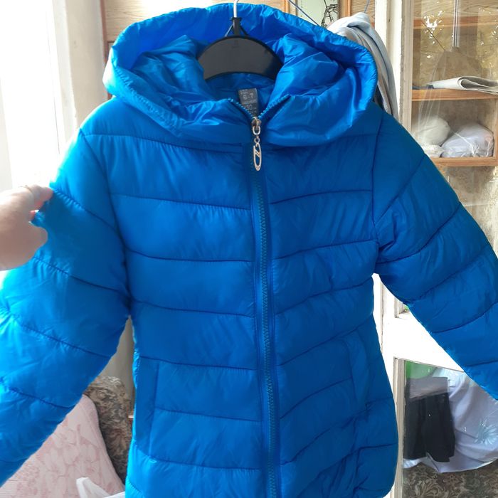 Курточка голубого цвета, размер 6-7л. 130 см