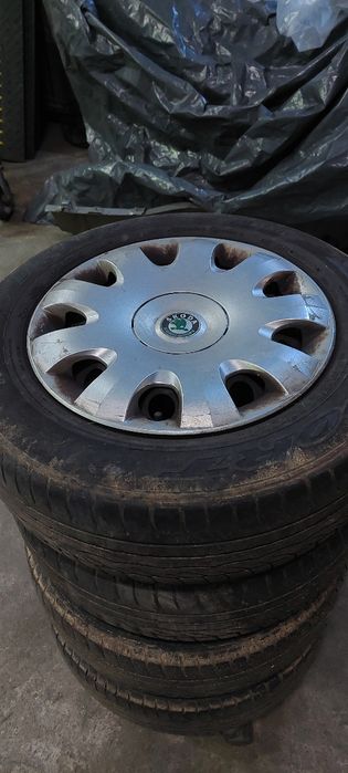 Set 4 roti vara tabla  195/65 R 15 audi vw skoda etc. cu capace originale skoda octavia 2
