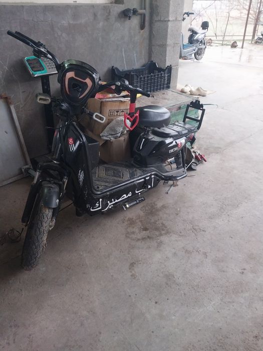 Скутер электравелосипед