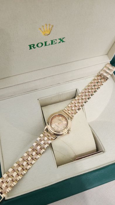 Женские золотые часы Rolex