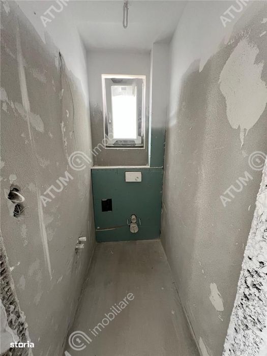 Casa cu 3 camere 2 bai si curte de 170 mp zona Calea Cisnadiei Sibiu