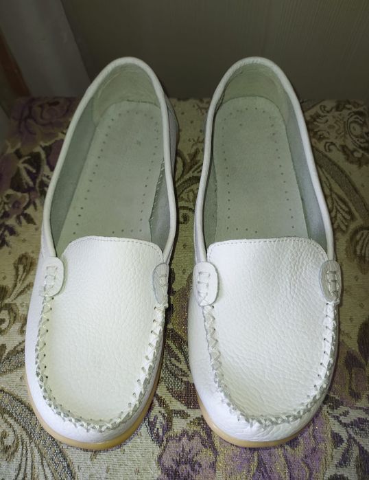 Новые кожаные туфли