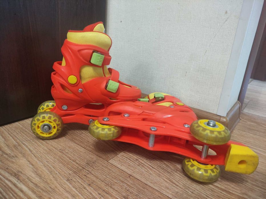 Роликовые коньки