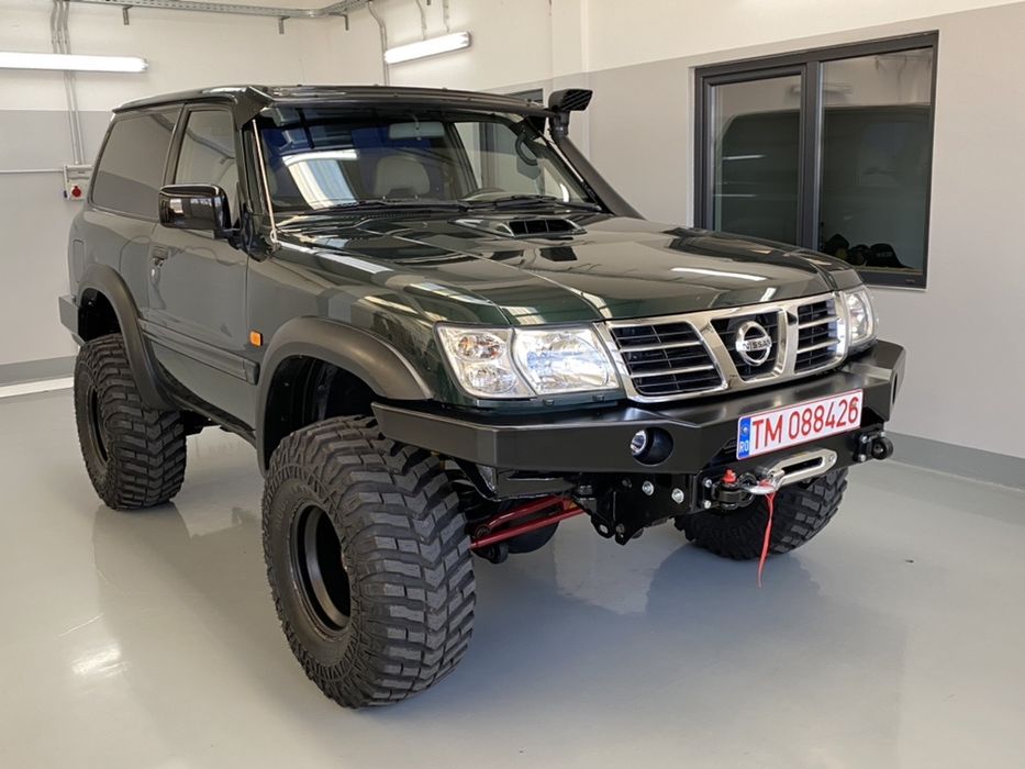 Bara fata Nissan Patrol Y61 cu suport de troliu