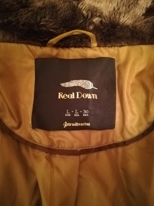 Пуховик, б/у, в нормальном состоянии.