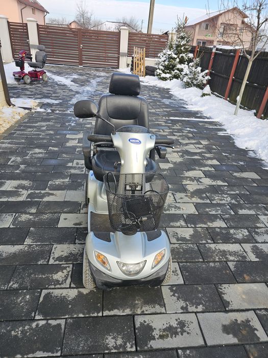 Scuter electric carut persoana cu dizabilitati  invocare