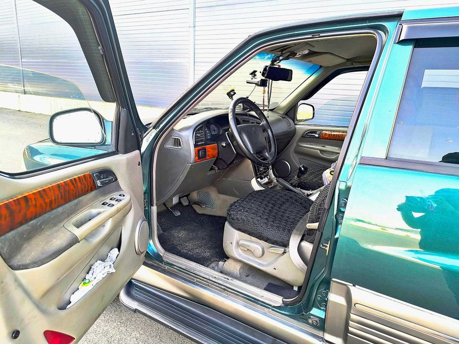 Ssangyong Musso  OFF-ROAD  2003 года выпуска бензин-метан .