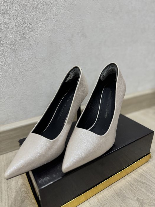 Продам туфли белестящие