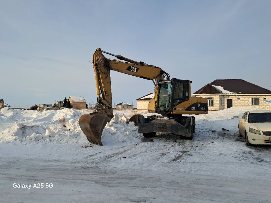 Услуги экскаватора, колесный экскаватор