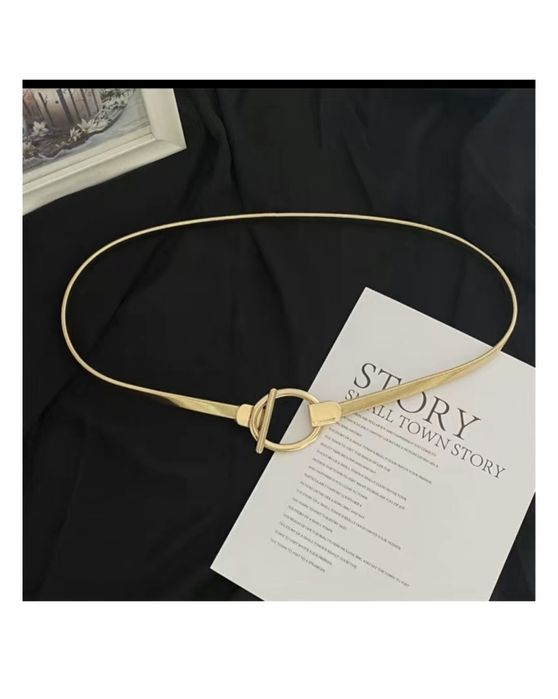 Ремен золотистый новый