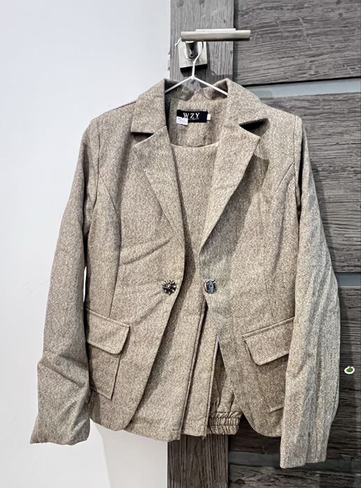 Женские брючные  костюмы