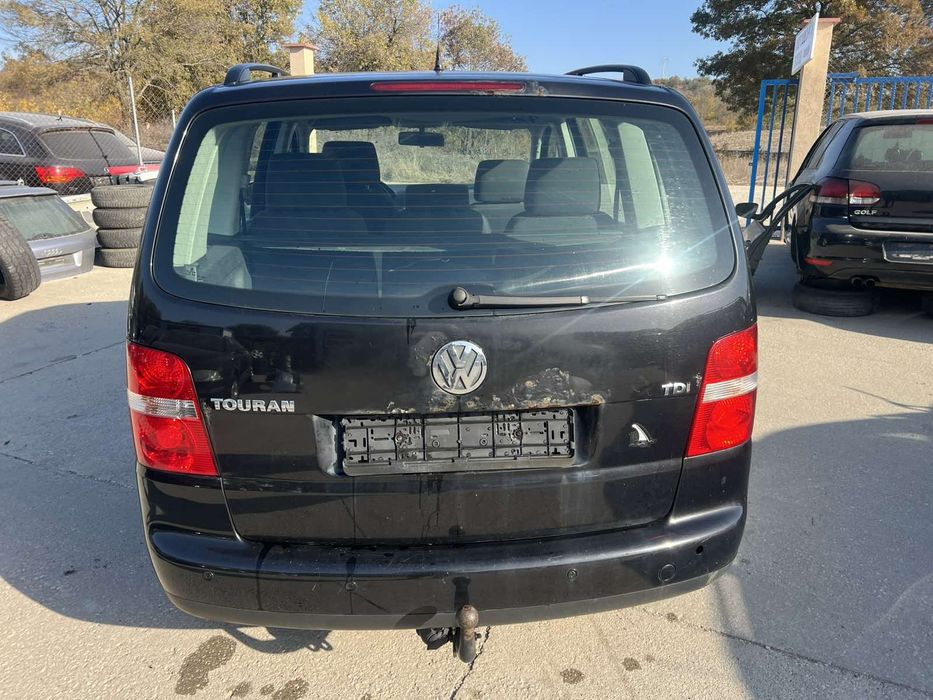 Vw Tuaran 1.9 105кс.код на мотора BKC 2006 г