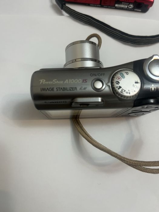 Canon A1000is 10 Mpx 5x zoom optic,afisare data si ora pe poze
