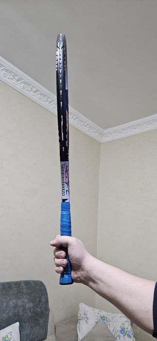 Теннисная ракетка