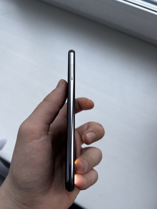 Телефон Xiaomi Mi 9 SE