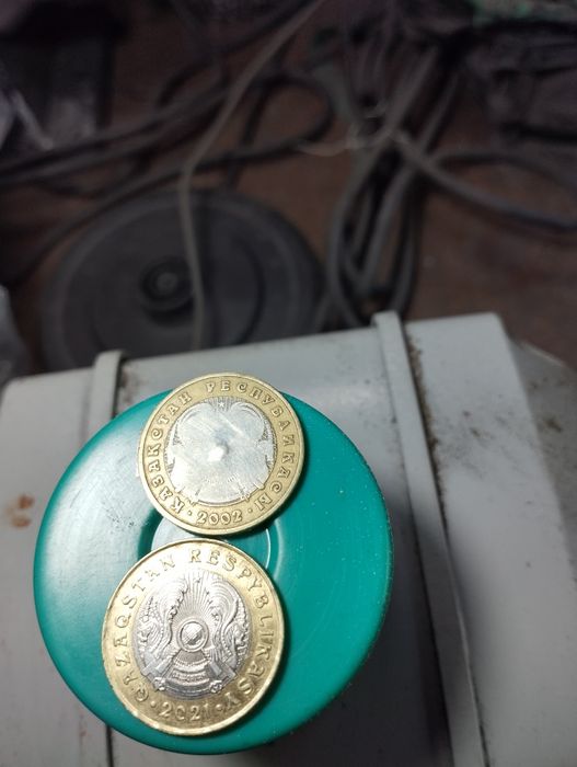 Монета 100т брак