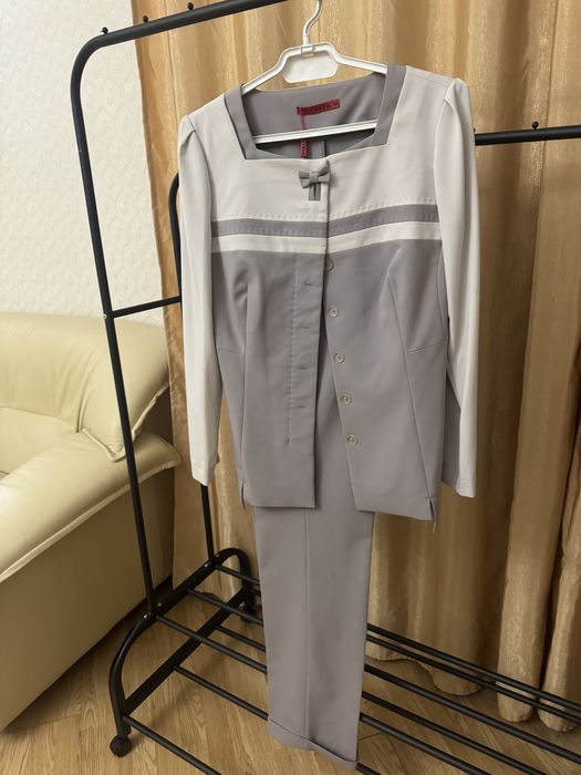 Брючные костюмы новые