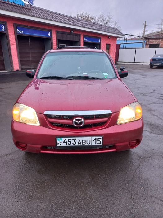 Проас Mazda tribute