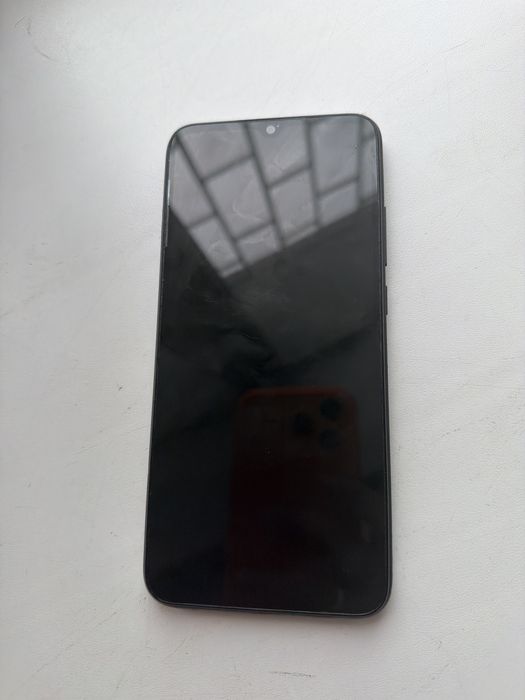 Продам телефон Redmi.