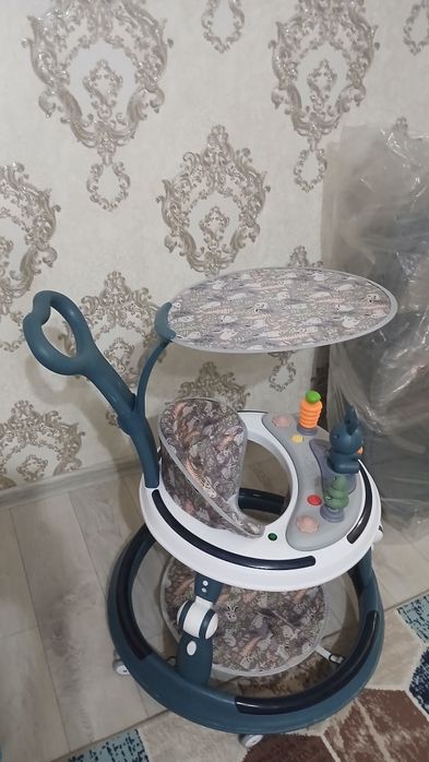 Продам детские ходунки почти новые