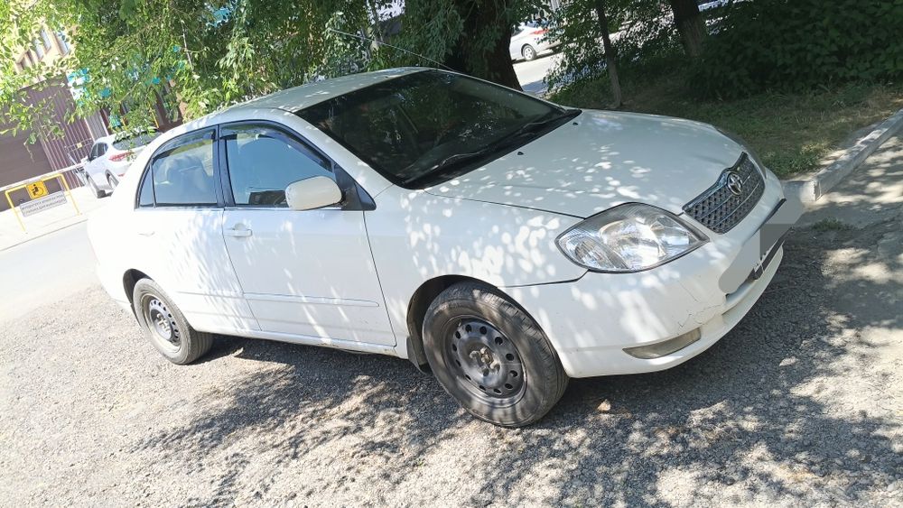 Тойота каролла Е120