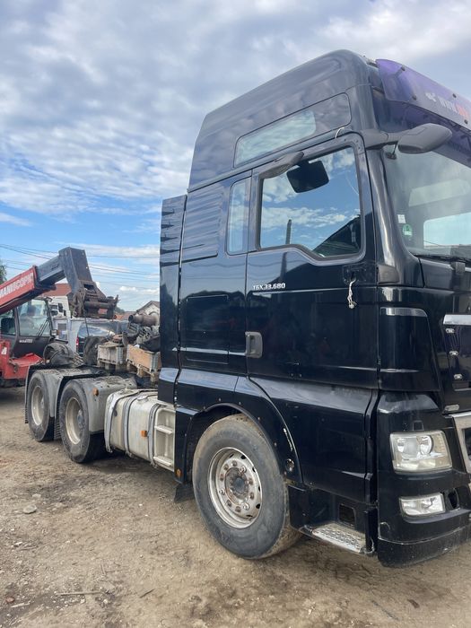 Dezmembrez/piese MAN TGX 680 (2 buc.) -motor, cutie de viteze etc.