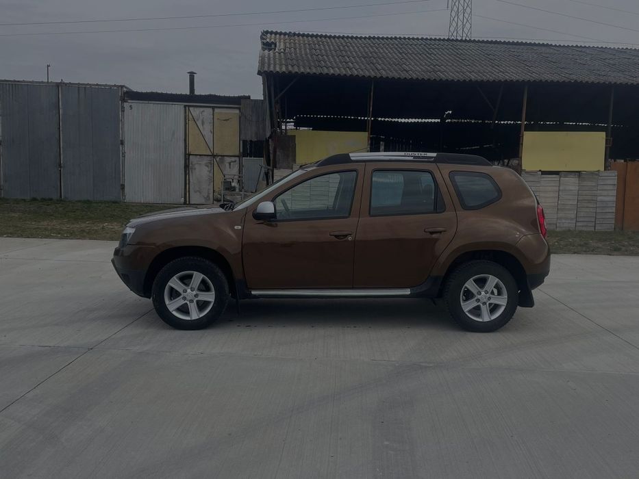 Dacia Duster diesel ,2011 4x4 la buton