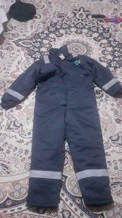 Спецодежда  продам 20000тн новая