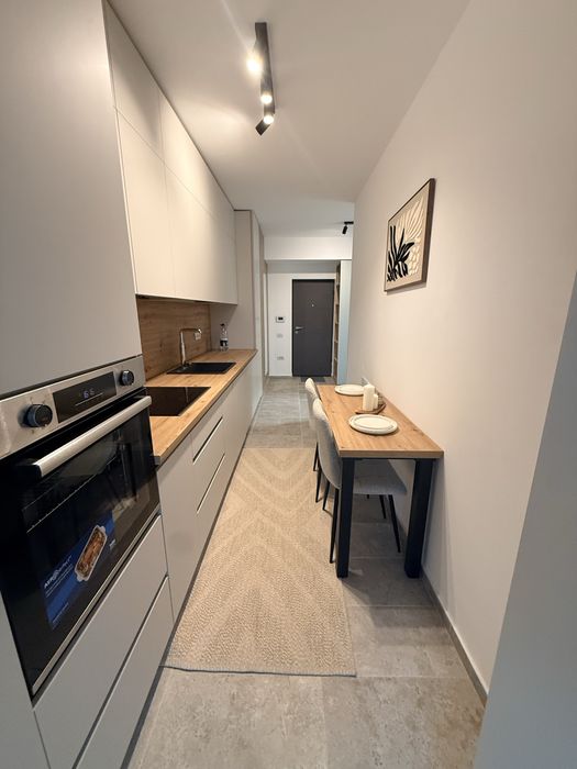 Studio modern, prima închiriere, amenajat premium + balcon spațios
