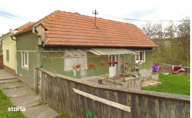Cota 1/2 din casa si teren