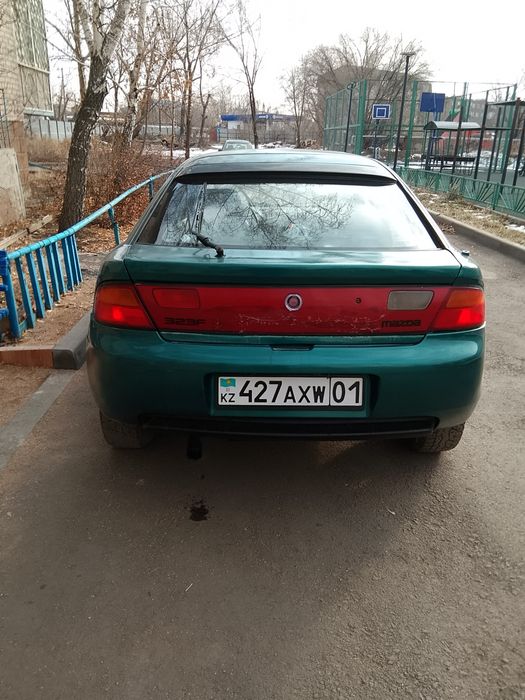 Автомобиль Мазда 323