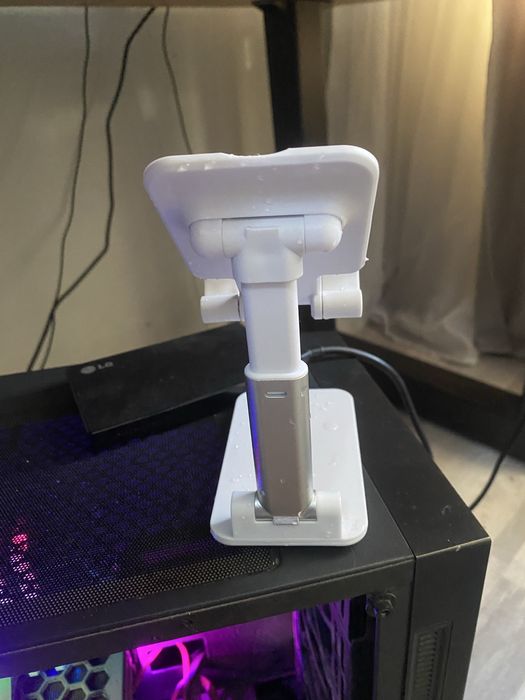 Подставка для телефона джостика.