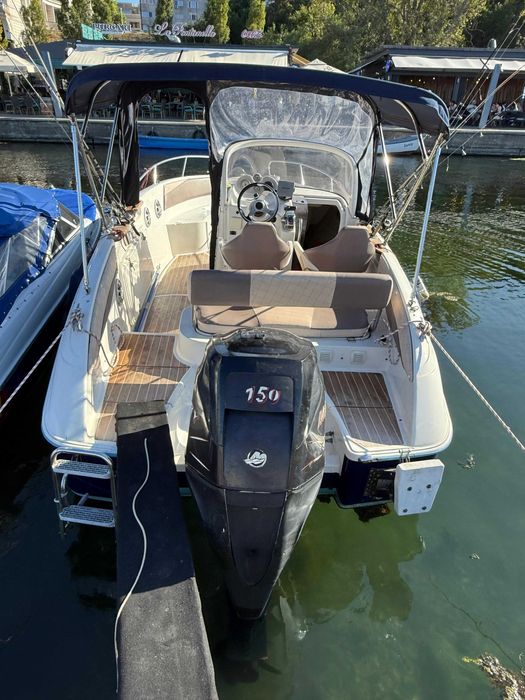 Quicksilver Commander 600 + motor 150 CP