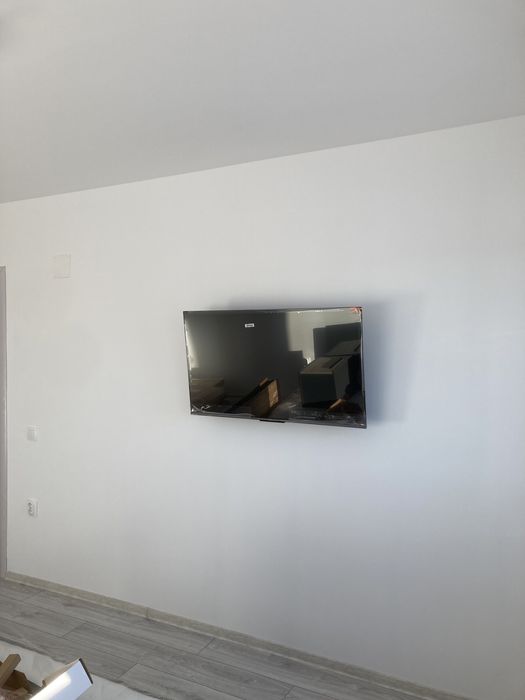 Instalare tv perete . Montaj suport tv