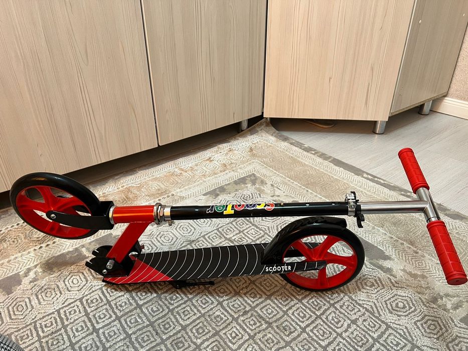 Новый самокат не использованный