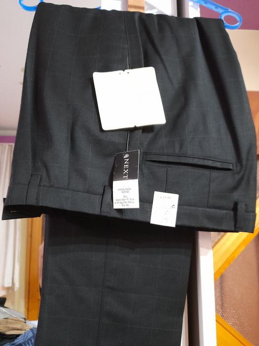 Vind pantaloni negri cu dungi "Next" din London măr.36