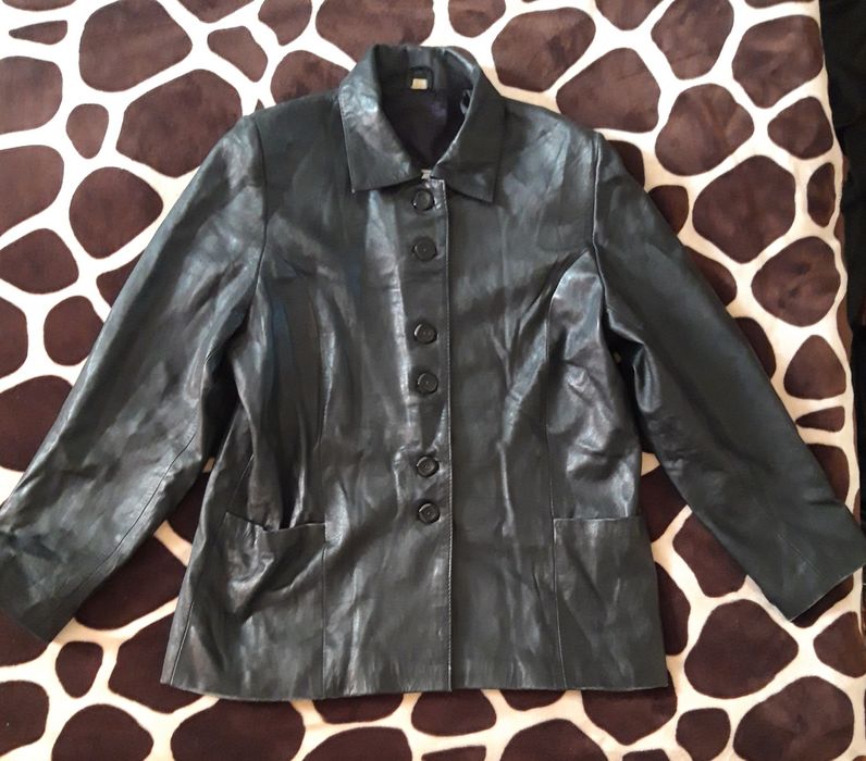 Пиждак кожанный женский. Размер (М) 48. В отличном состоянии.