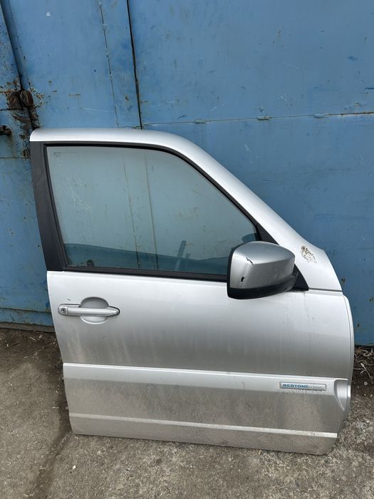 Дверь нива шевроле бертоне