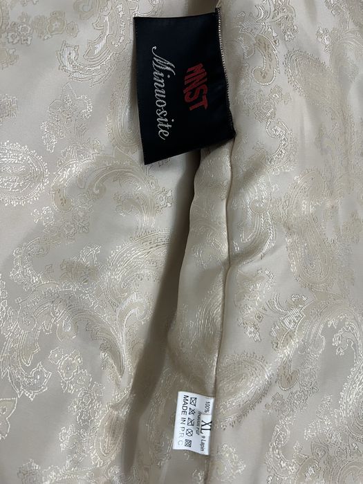 Продам меховую жилетку