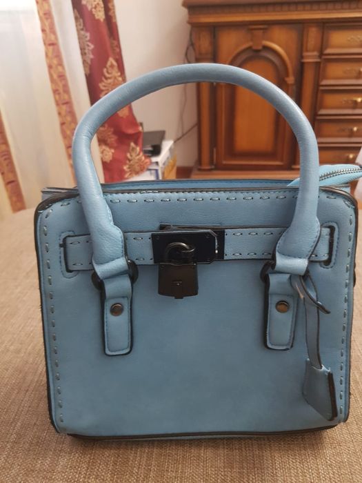 Продам голубую сумочку