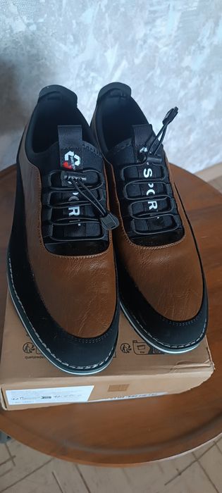 Продаю новые мужские туфли