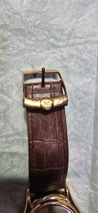 Золотые часы Ника