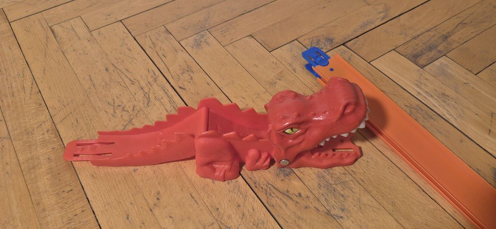 Lansator Hot Wheels DINO – Lansare prin Coadă (Gravitational)