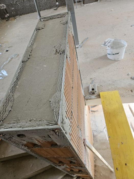 Execut tencuială mecanizată