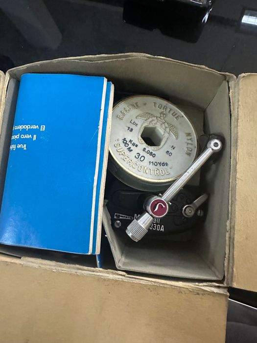 1957 Garcia Mitchell spinning reel 330А.