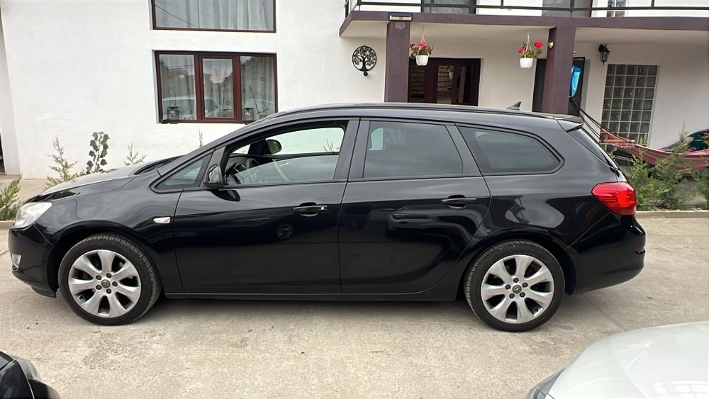 OPEL Astra 2011 — imagine 5