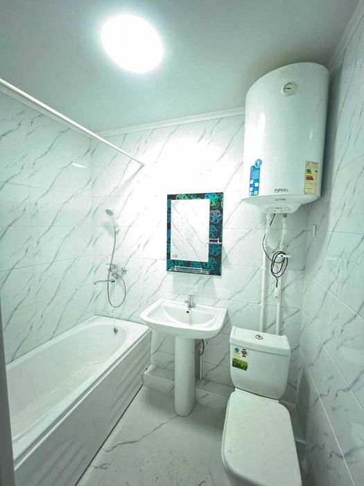 Янги домдан 1 хонали квартира сотилади 5 микрн